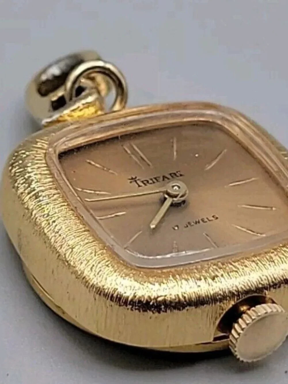Trifari crown pendant